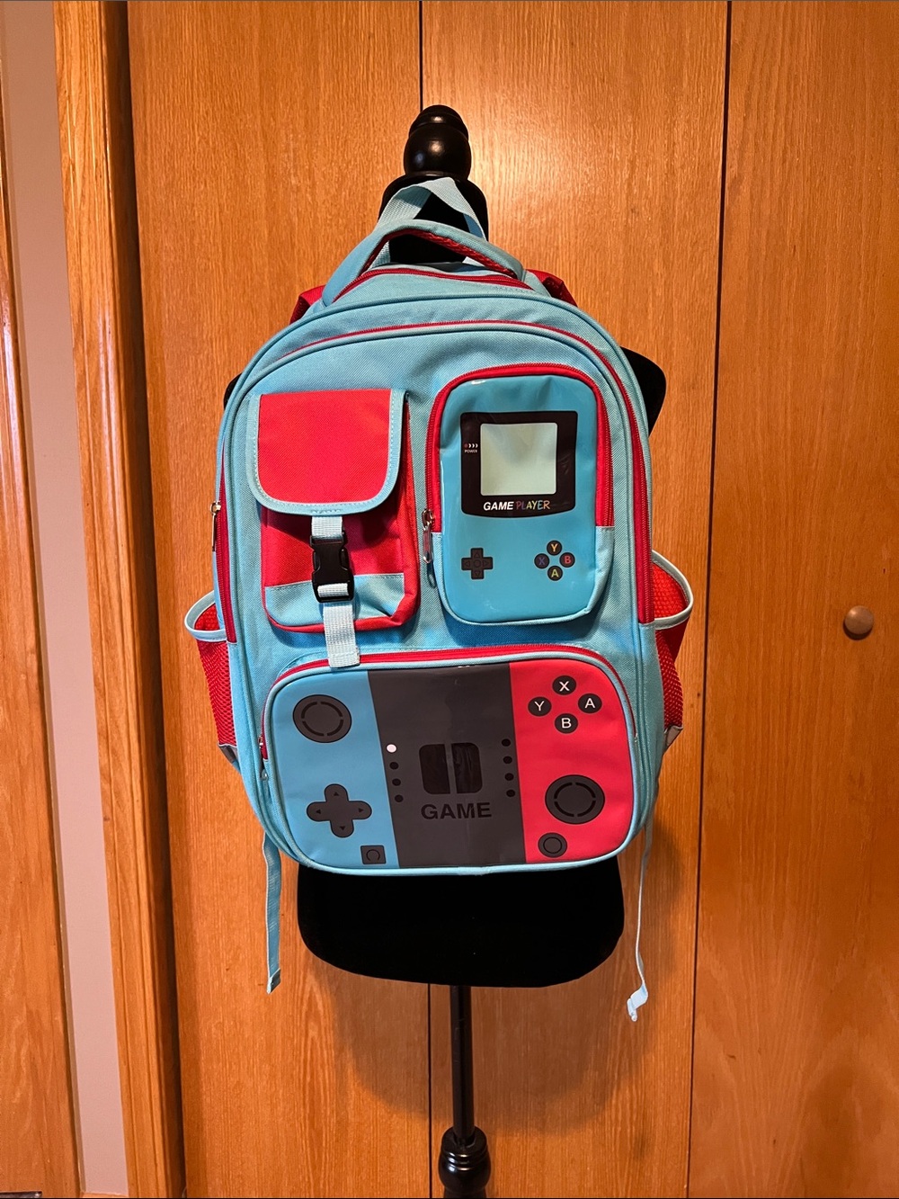 Gamer kids 17in. backpack good cond. with game boy theme.